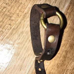 Handmade fire damaged bracelet/brass and American rawhide-Unknown Artist. 0101